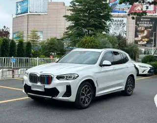 BMW X3 2022 blanc vu de profil — véhicule importé de Chine par Chine Direct Auto