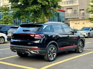 Dongfeng Fengshen AX7 2022 noir de trois quarts arrière — véhicule importé de Chine par Chine Direct Auto