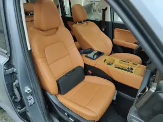 Haval Raptor PHEV 2026 gris sièges avant en cuir fauve — véhicule importé de Chine par Chine Direct Auto